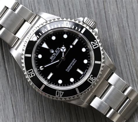 rolex submariner 14060m 2 liner vs 4 liner|Rolex Submariner reference numbers.